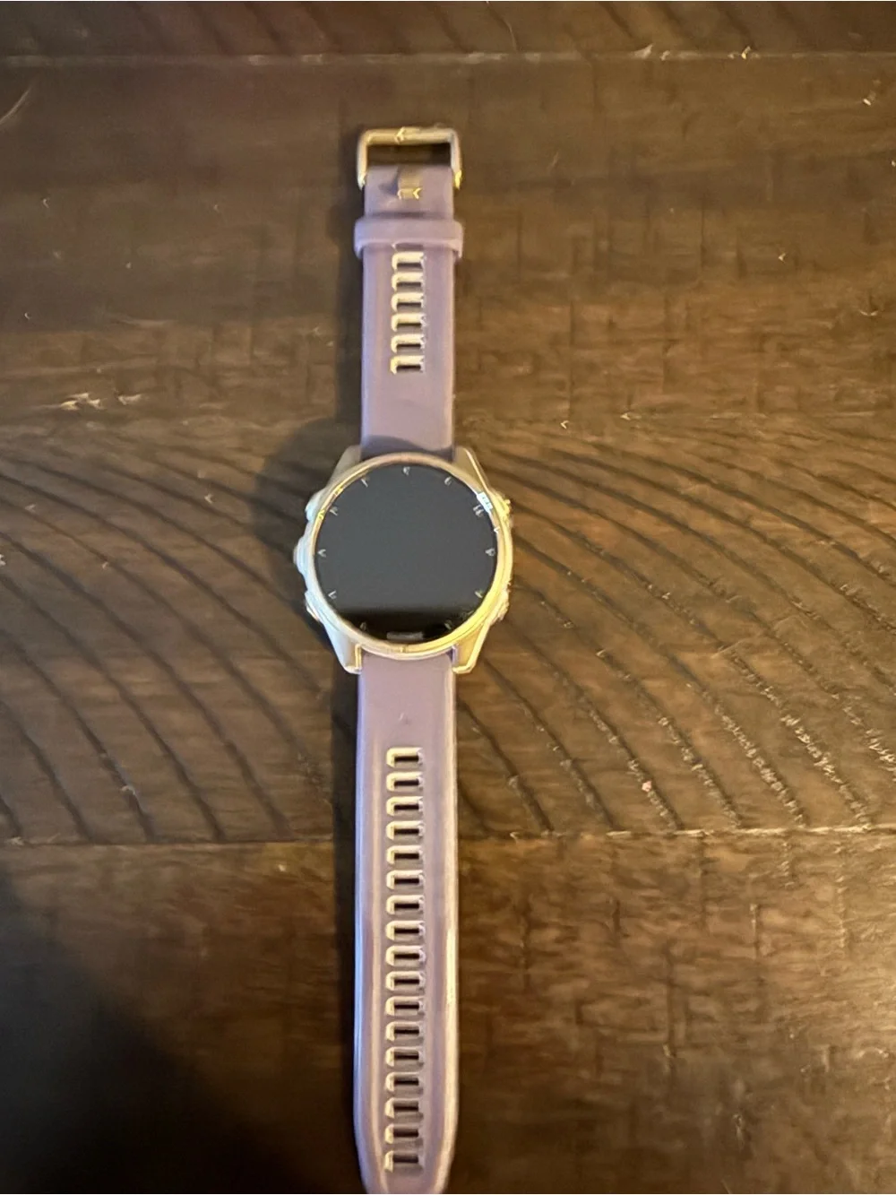 garmin Fēnix 8 smartwatch with purple strap - AMOLED display